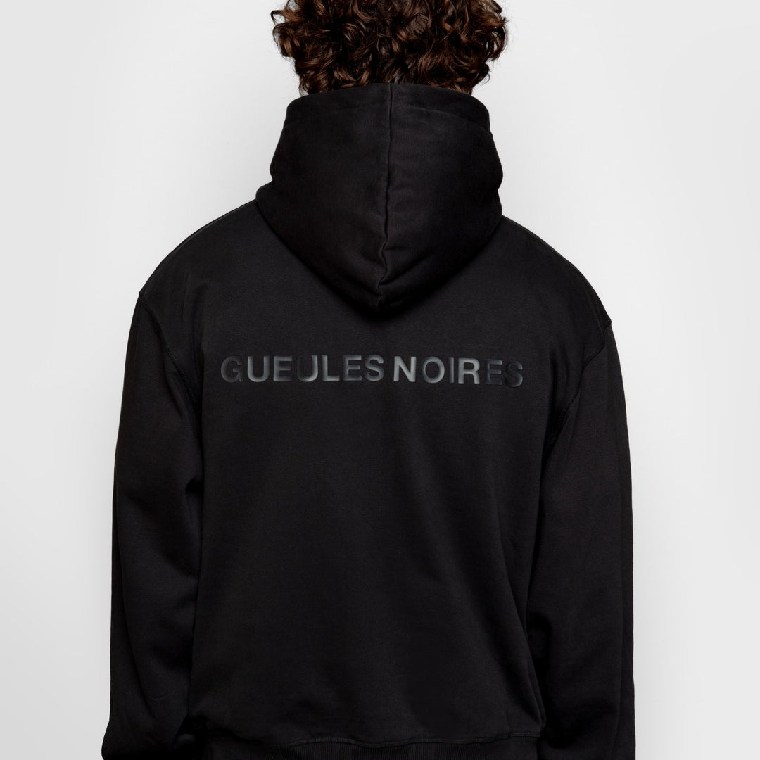 Minimaliste gueules noires coupe oversize